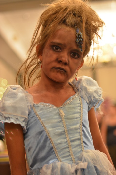 I believe she won the kids costume contest. Creepy as hell. 